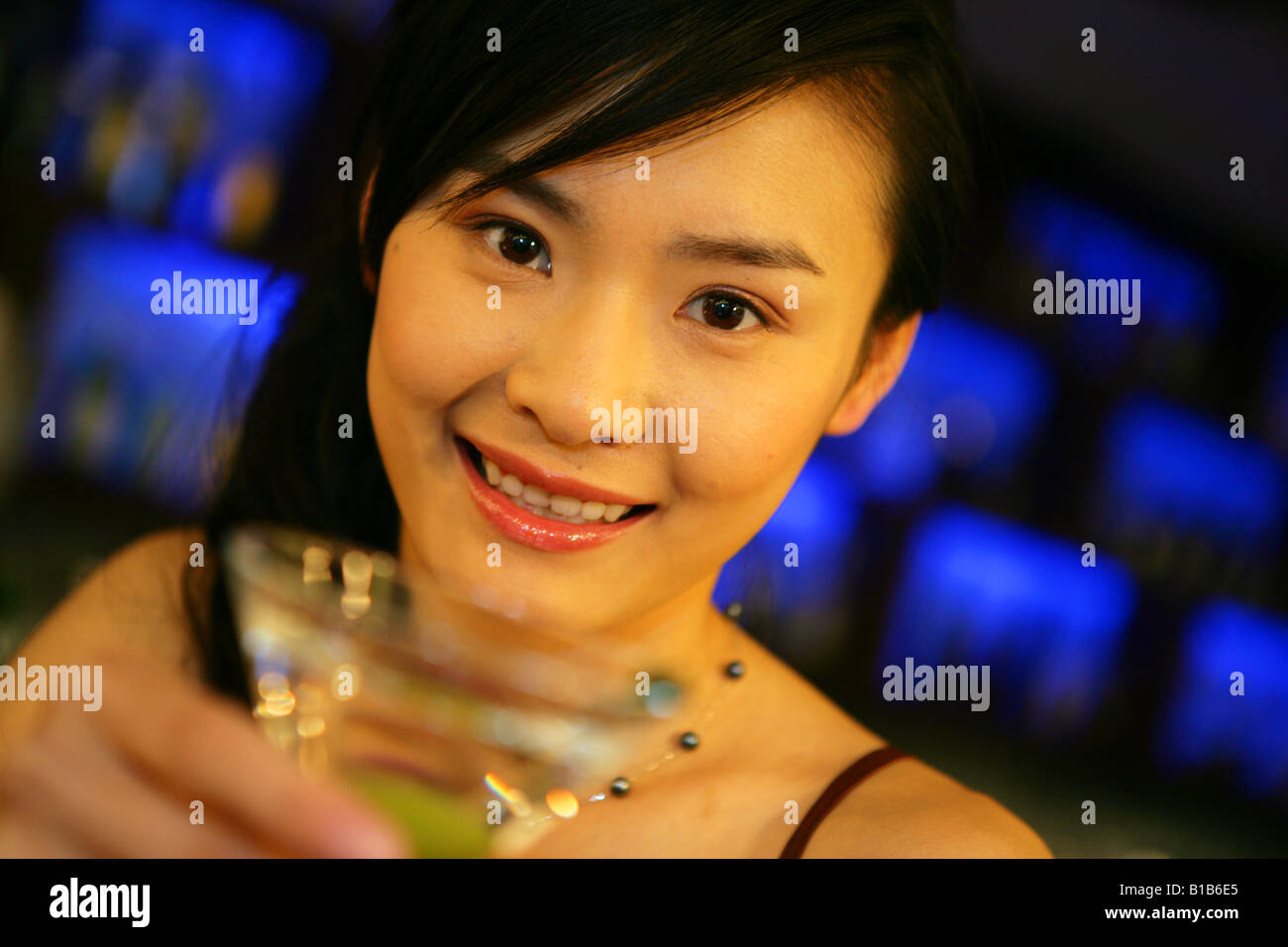 Female holding cocktail hi-res stock photography and images - Alamy