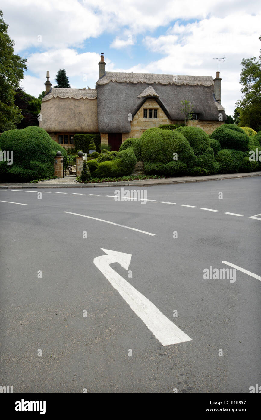 An arrow indicating a right turn off a main road in Chipping Campden, Gloucestershire UK. Stock Photo