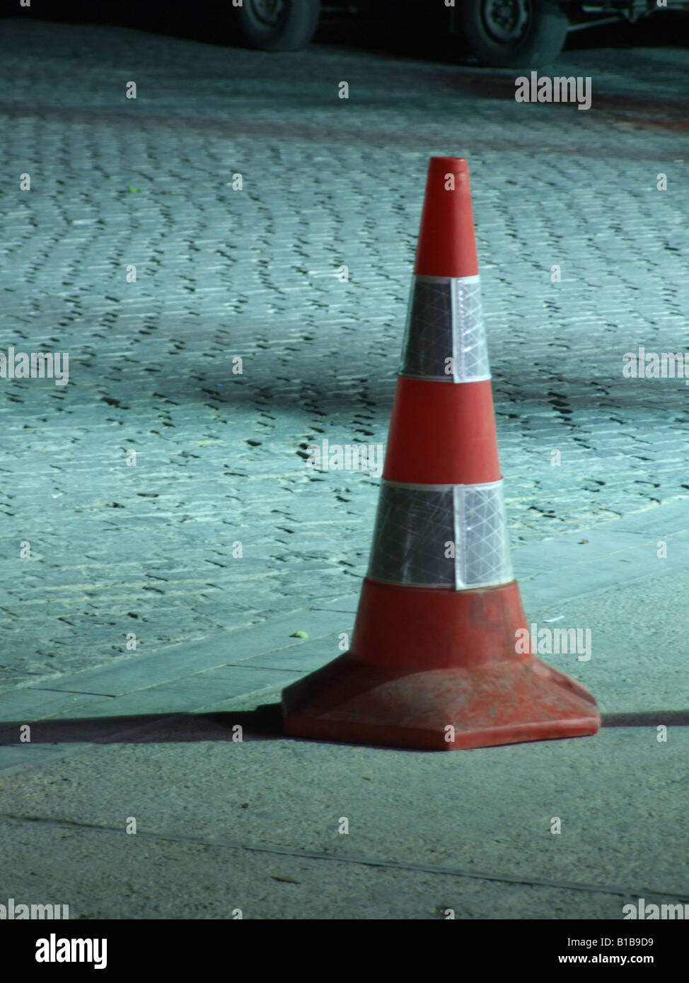 traffic cone in street at night Stock Photo Alamy