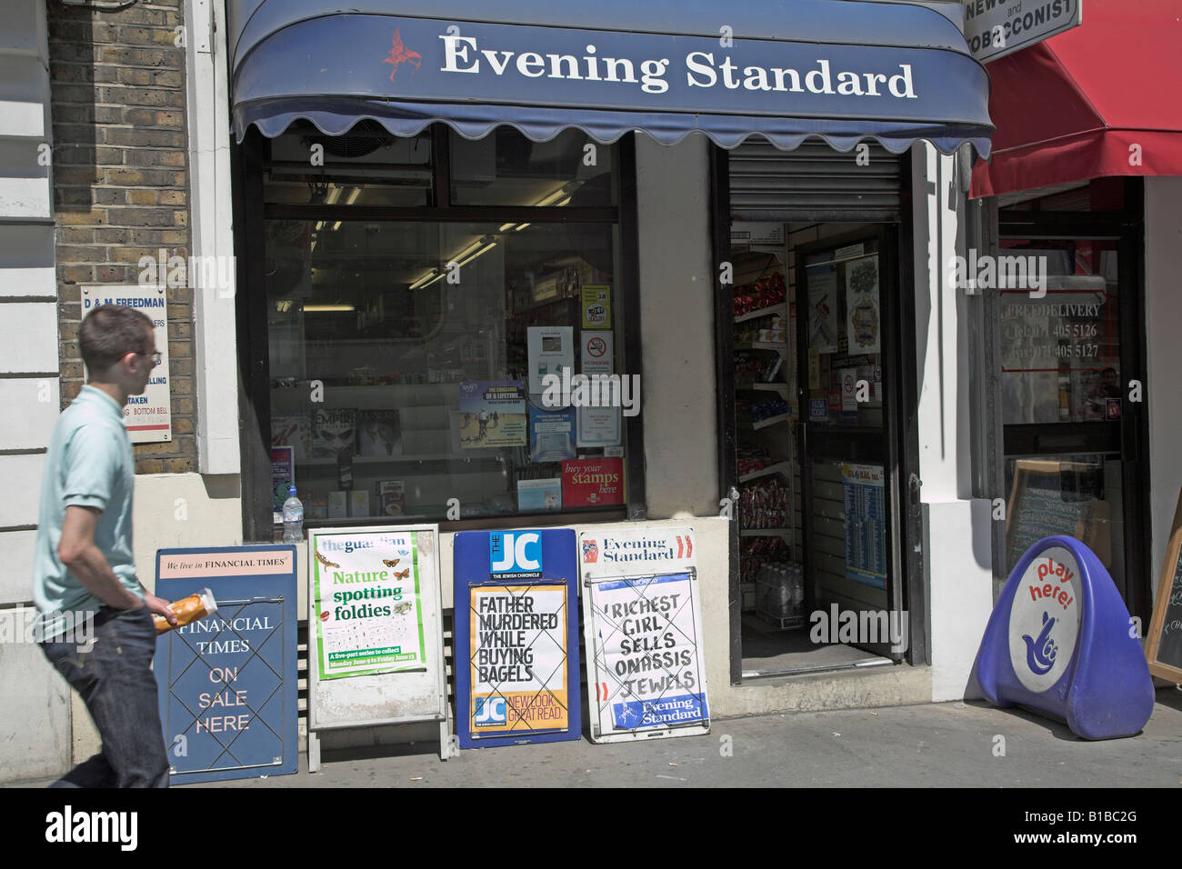 Small newsagents shop advertising Evening Standard, London Stock Photo
