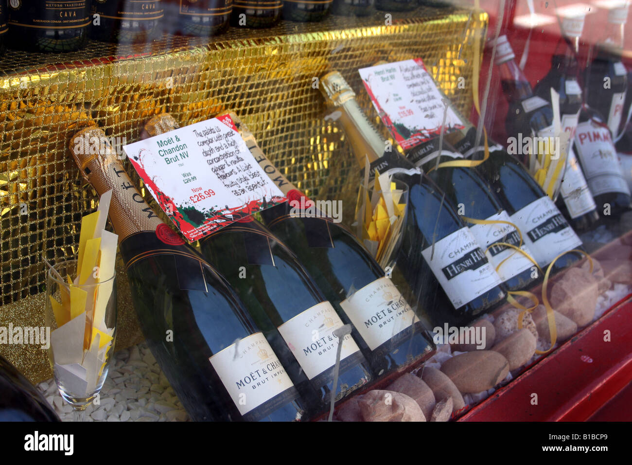 Champagne for sale in a shop window. Stock Photo