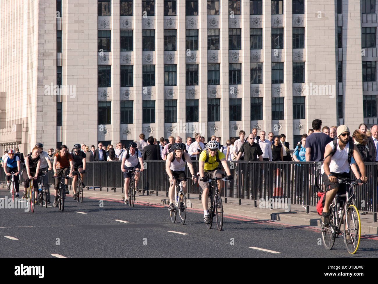 Commuters Cycling Home - Evening Rush Hour - London Bridge Stock Photo