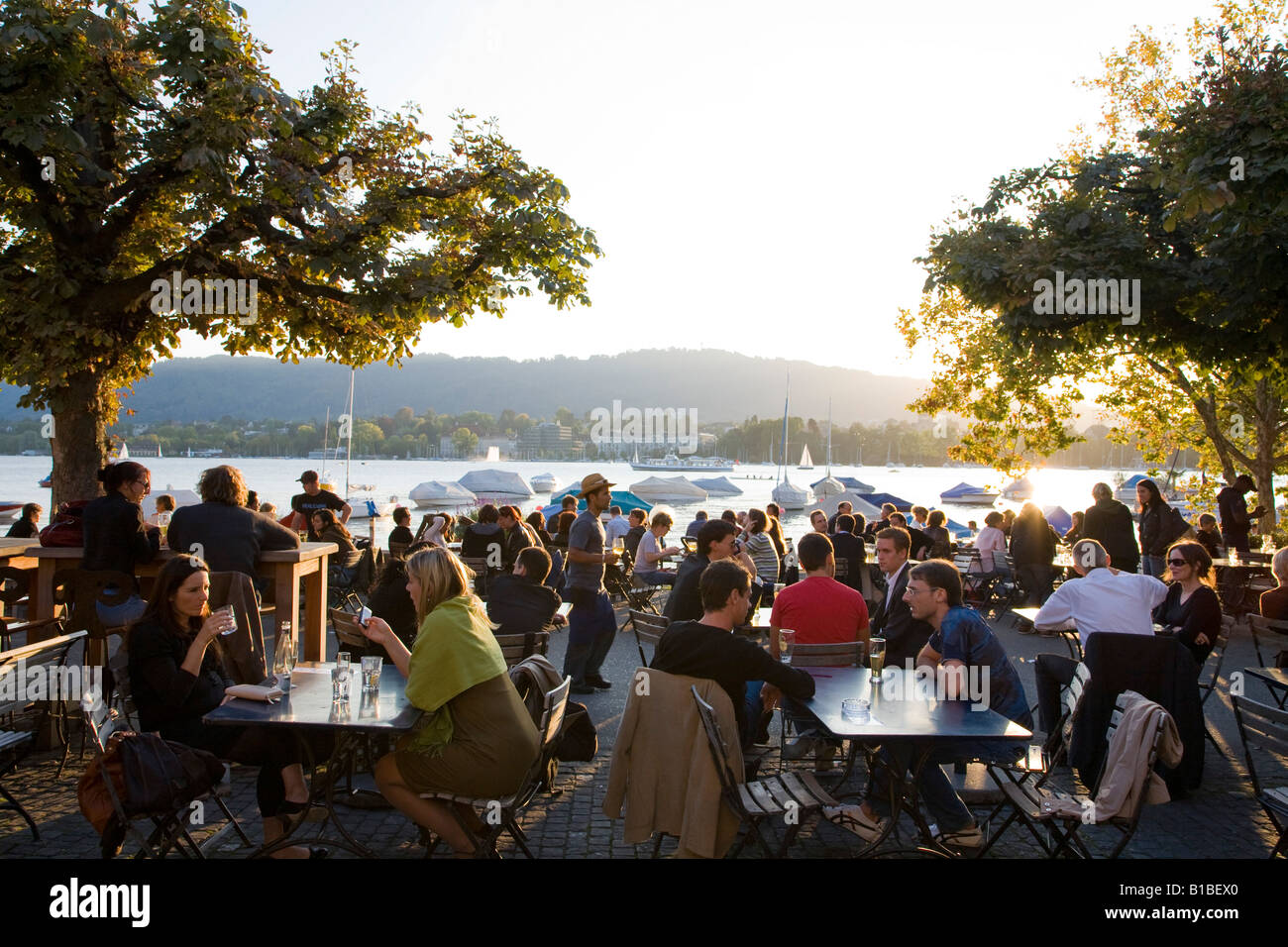 Switzerland, Zurich, Seefeldquai, beer garden and Lake Zurich Stock