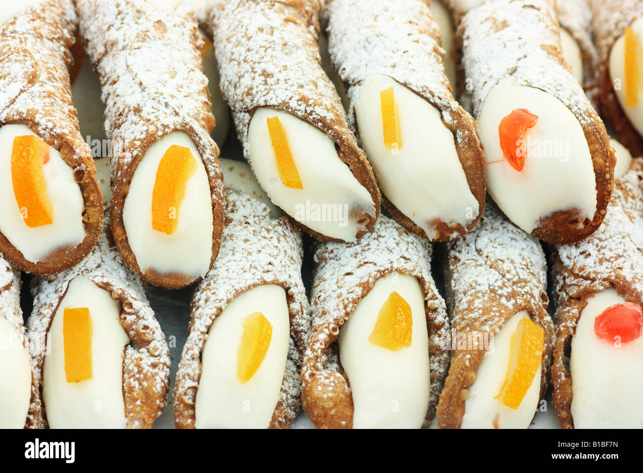 Cannolo siciliano typical sicilian sweet that is waffle pastry filled with ricotta cream Stock Photo