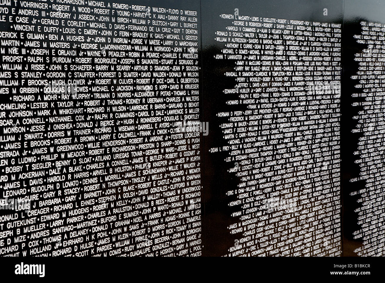 Names of fallen soldiers on the Vietnam war traveling memorial wall Stock Photo