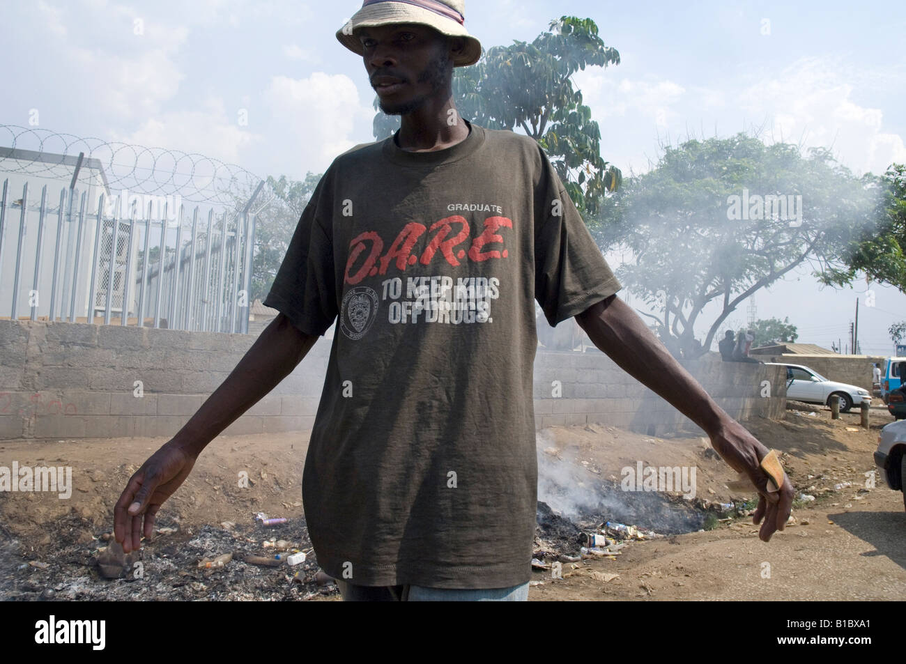 Man wearing T shirt with a message to keep kids off drugs, Lusaka Zambia Stock Photo
