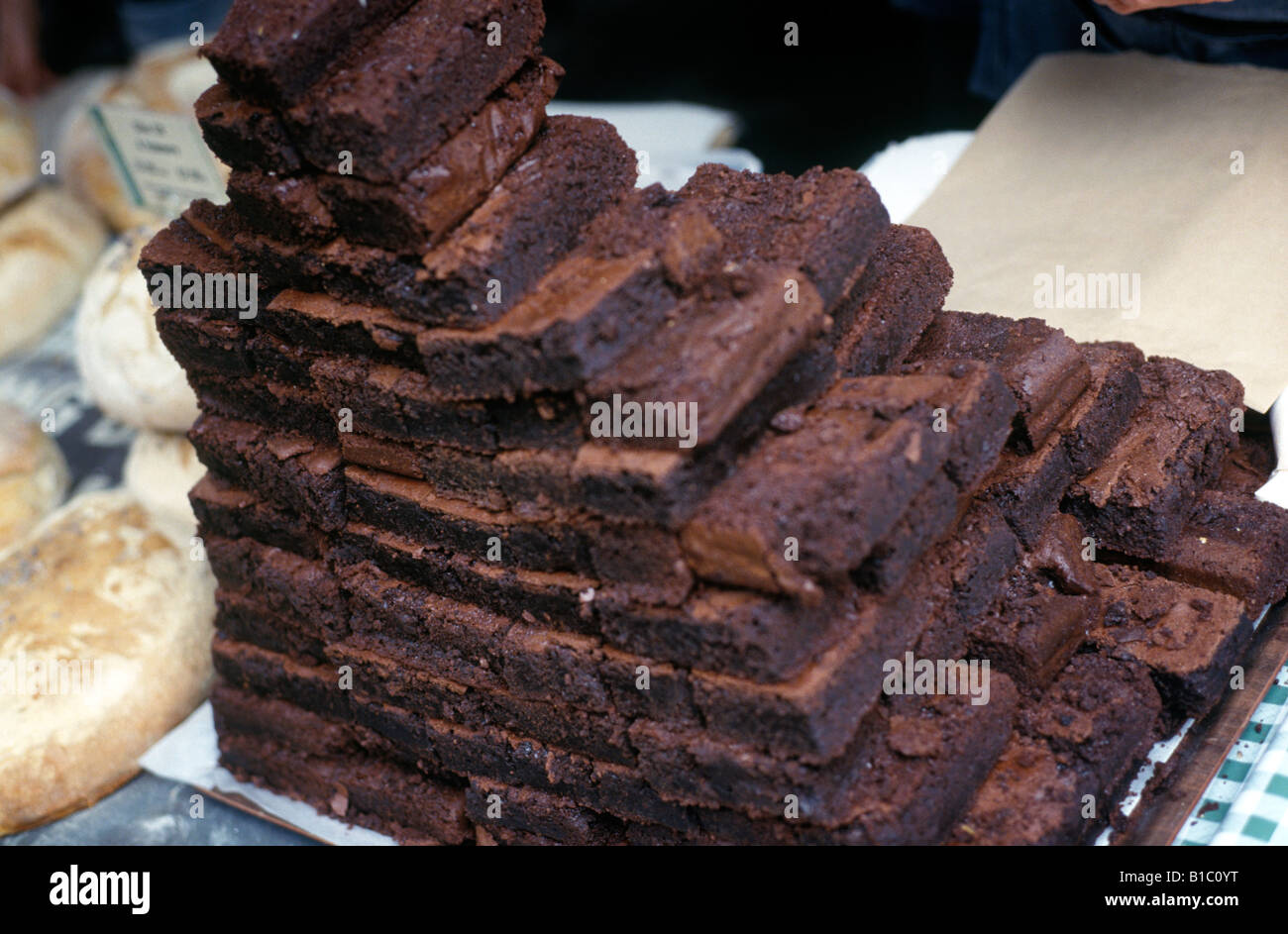 chocolate brownies on a market stall, Borough Market, London Stock