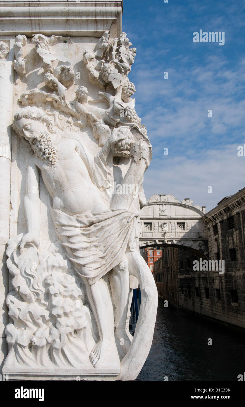 Venice, Veneto, Italy. Bridge of Sighs and detail from the Doge's Palace of 'The Drunkenness of Noah' Stock Photo