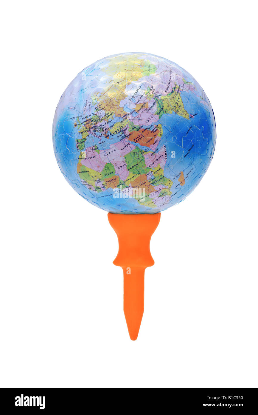 Globe in dimple texture on short orange golf tee Stock Photo