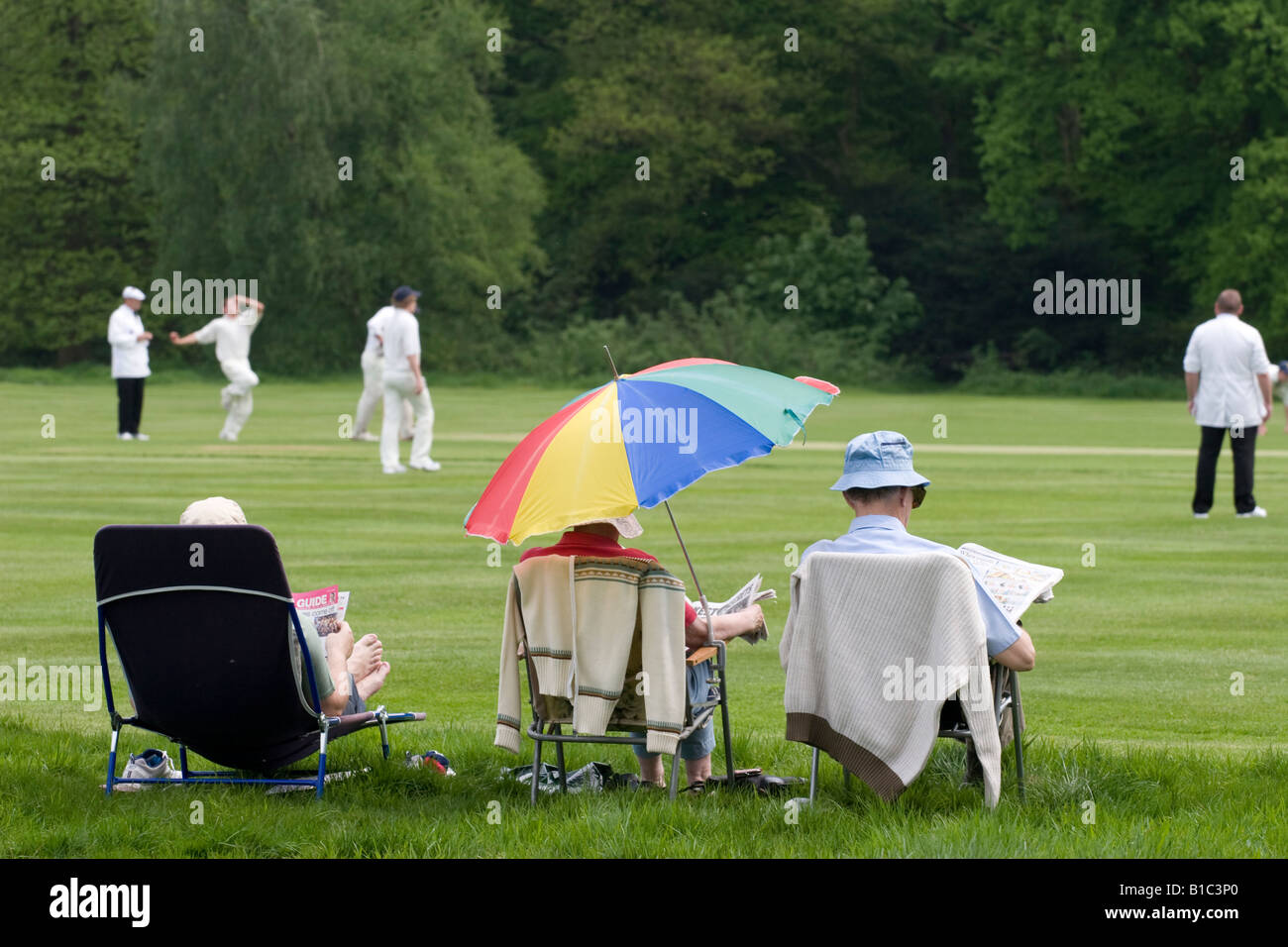 Cricket umbrella newspaper hires stock photography and images Alamy