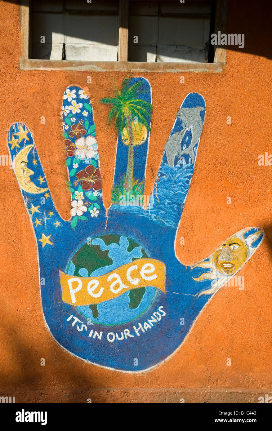 Indonesia Lombok Gili Air Wall Painting Of A Hand With Comment Peace Stock Photo Alamy