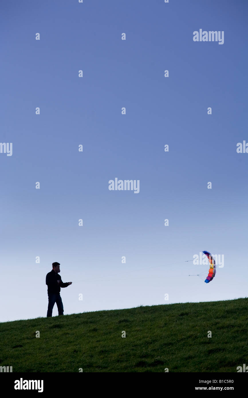 Kite flyer on Primrose Hill, London, UK Stock Photo