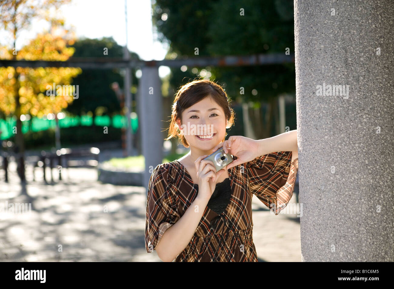 Young asian woman smile camera hi-res stock photography and images - Alamy