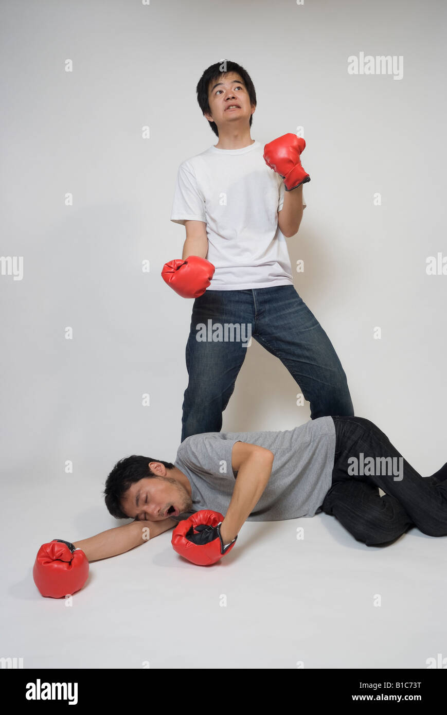 Two young men fighting Stock Photo