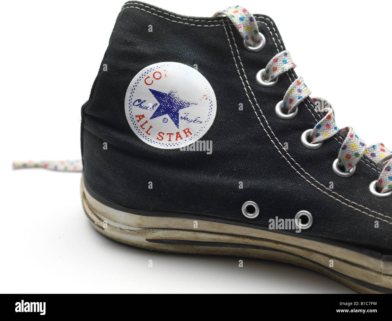 converse all star high latex back basketball dirty lace shoestring  personalized crest old ruined symbol frim trade name brand Stock Photo -  Alamy