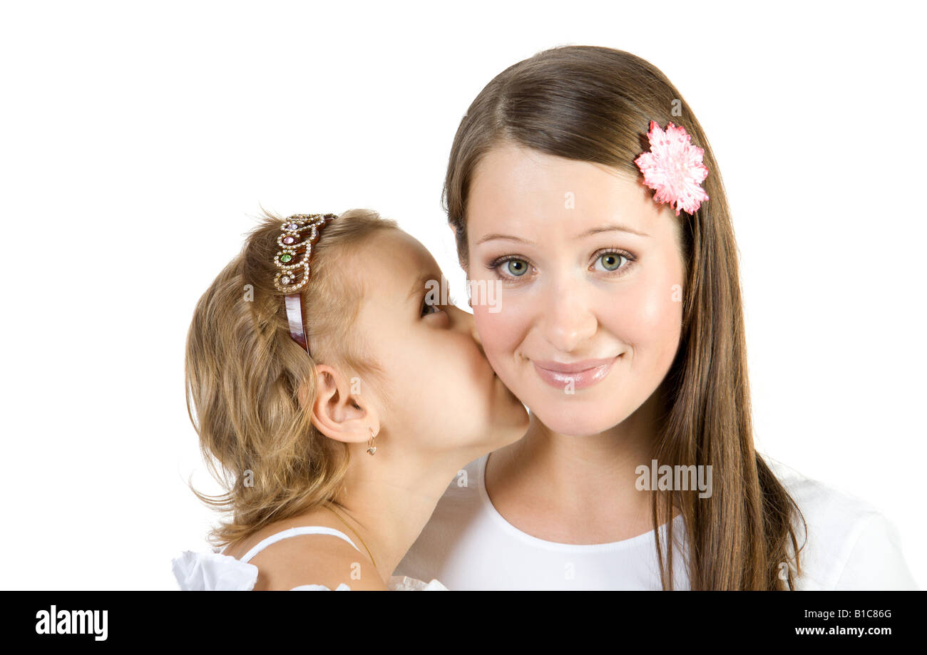 Little girl kiss mother Isolate on white Stock Photo