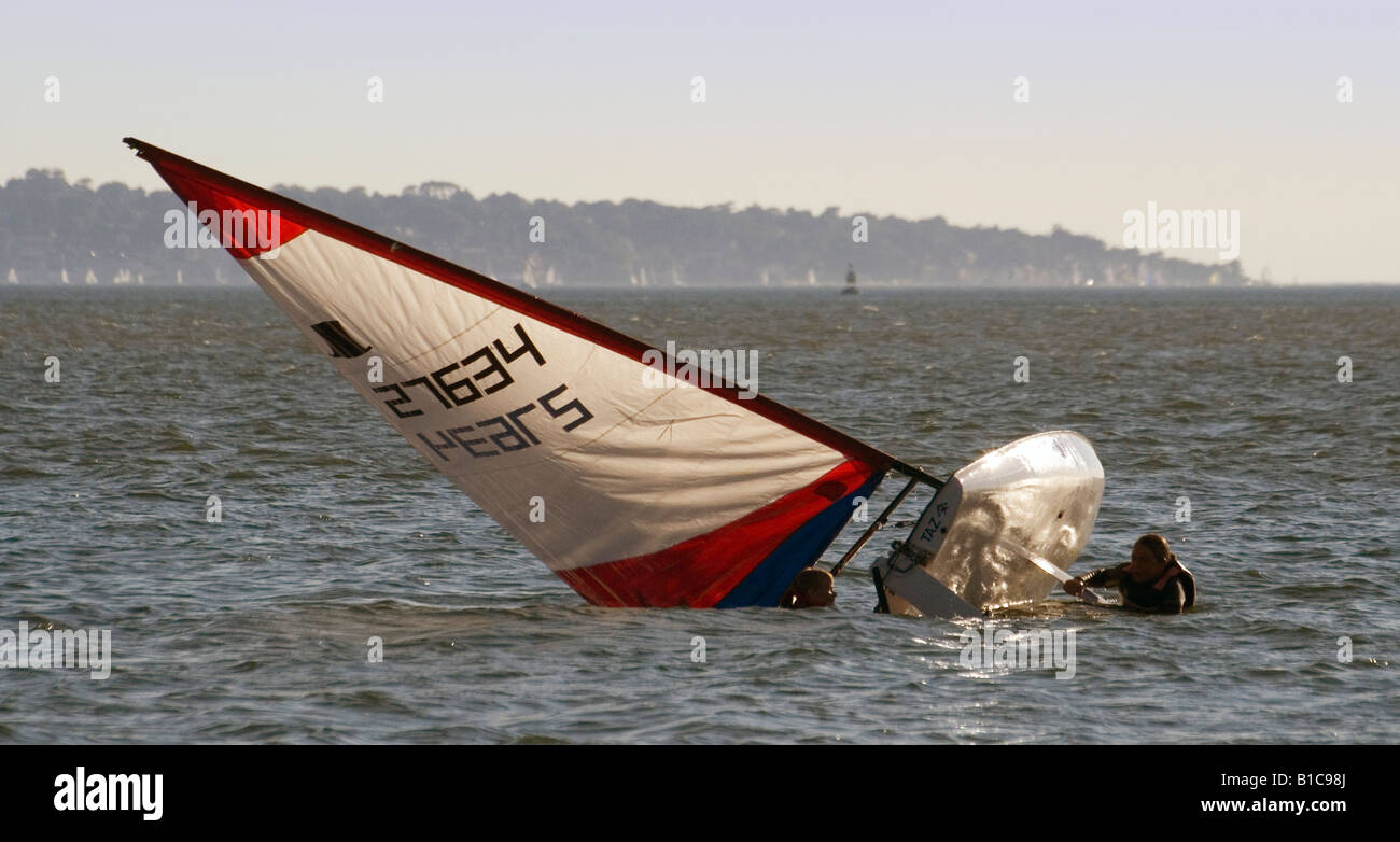 Small sail boat tipping over in the Solent. Taken at Lee On The Solent