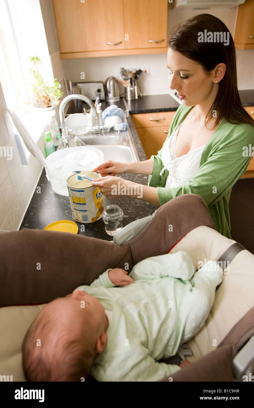 Mother preparing baby food Stock Photo Alamy