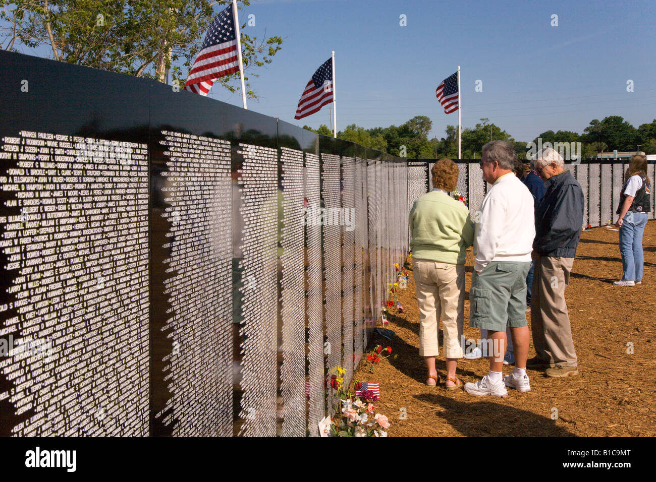 Family Members Of Fallen Soldiers Of The Vietnam War Look Up Names On The Traveling Memorial 