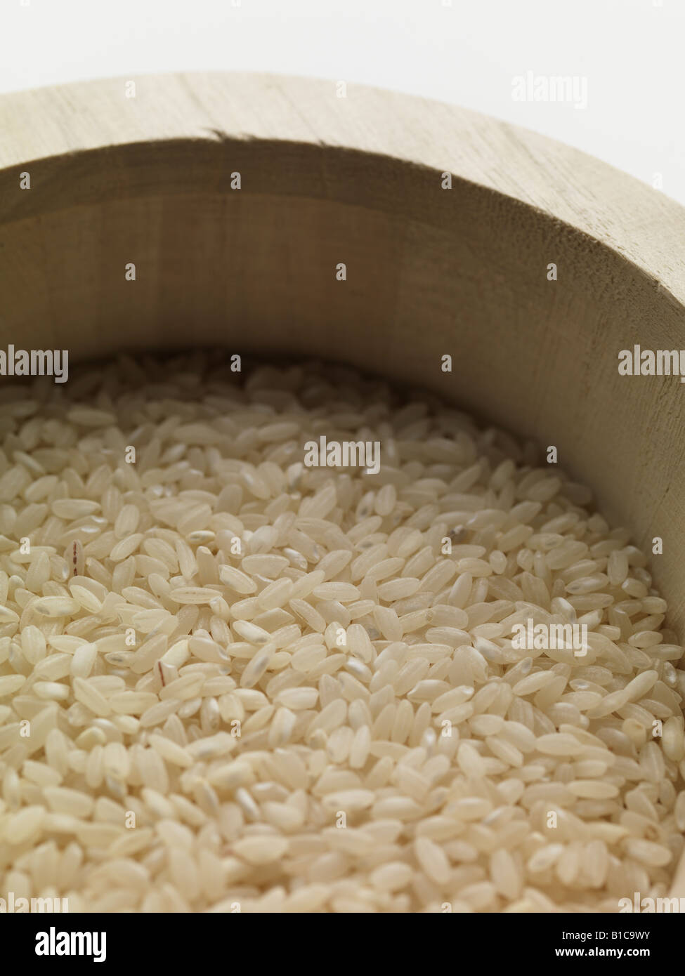 grain rice strew scatter food ingredient wood bowl Stock Photo