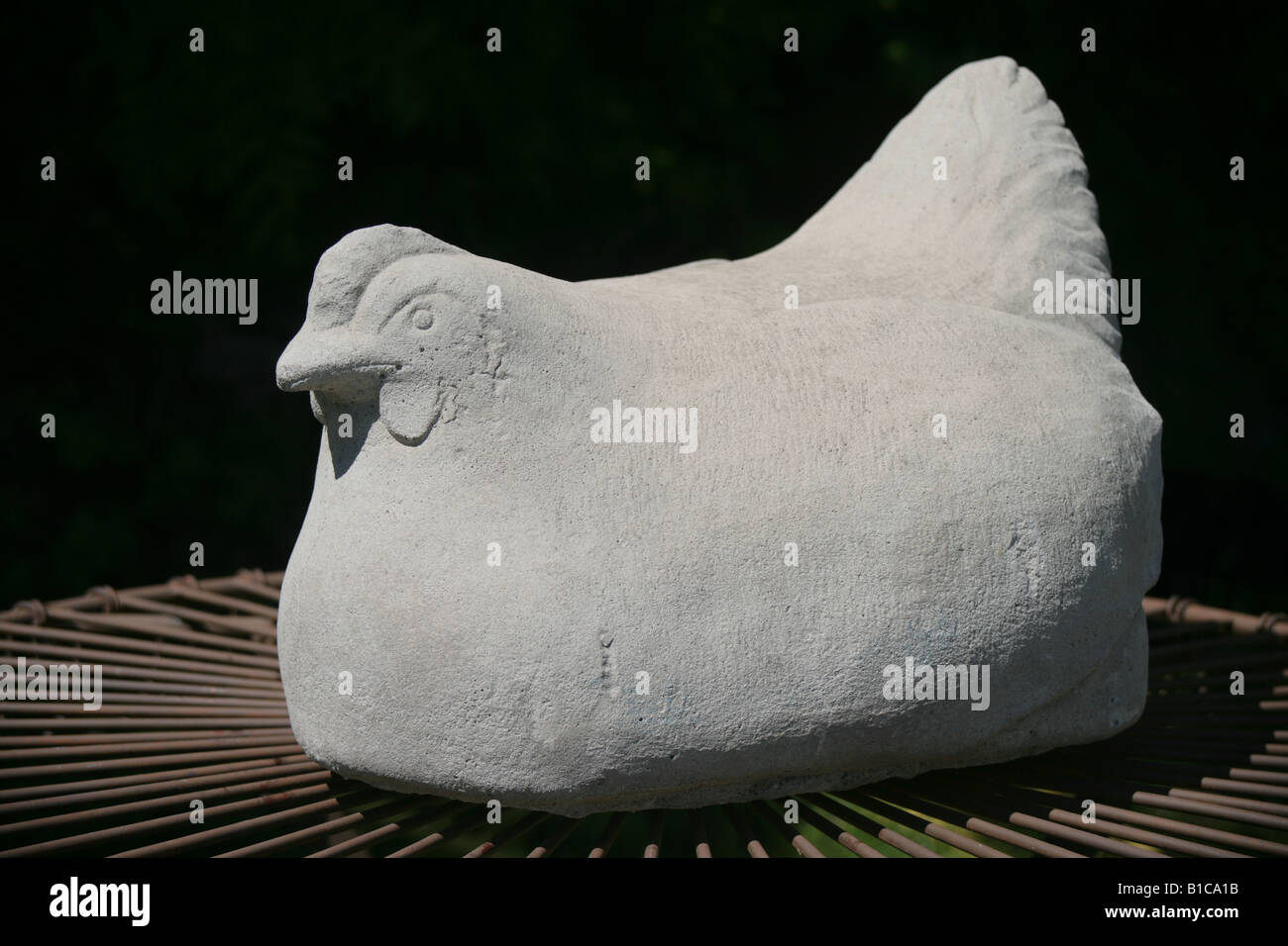 Fat hen stone finial garden ornament Stock Photo
