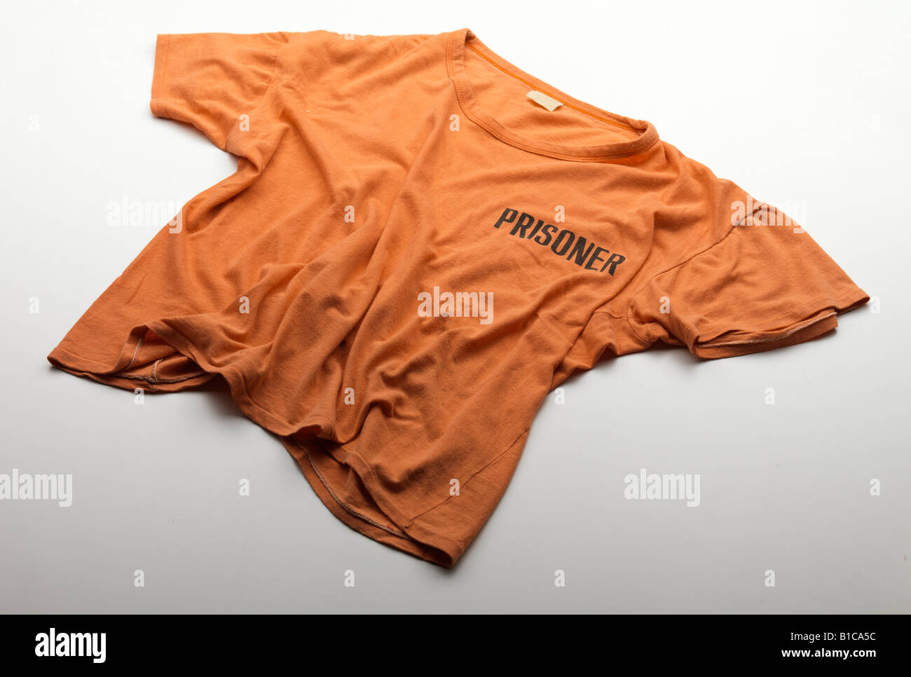 t-shirt cloth orange pleat round-necked uniform Stock Photo
