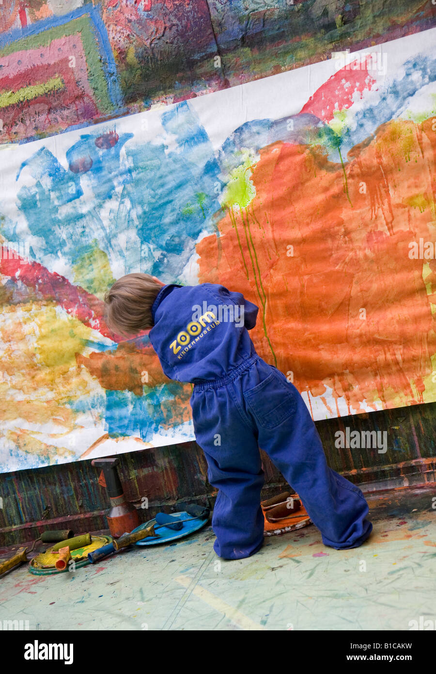 little boy painting a picture in the studio Stock Photo Alamy