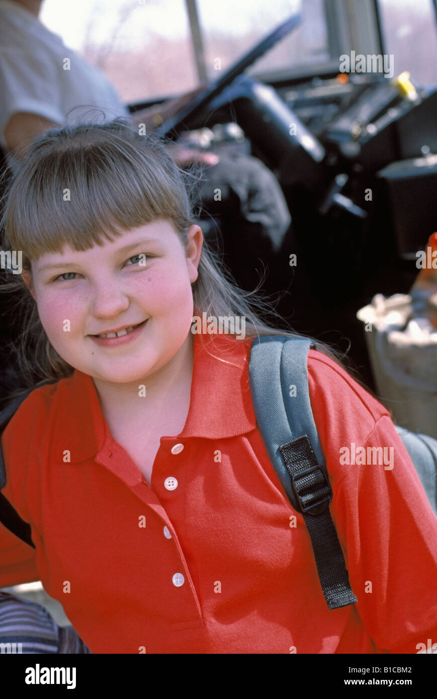 Caucasian girl boarding school bus Stock Photo Alamy