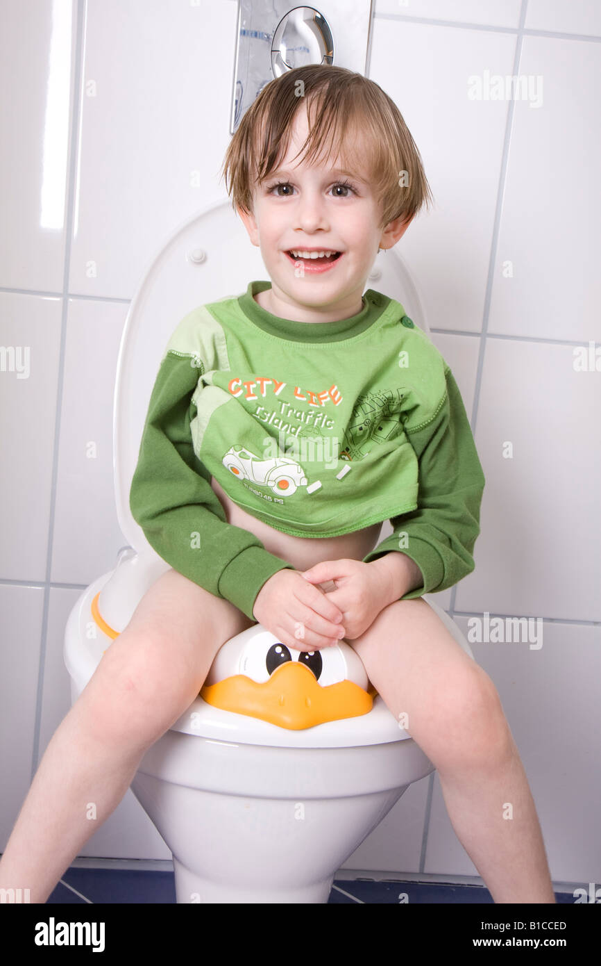 little boy sitting on the toilet Stock Photo - Alamy