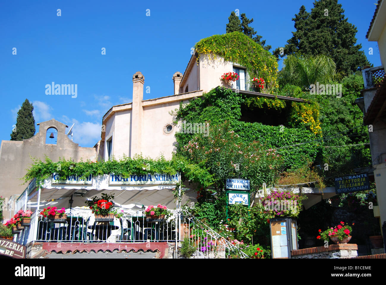 Restaurant balcony, Corso Umberto I, Taormina, Messina Province, Sicily, Italy Stock Photo