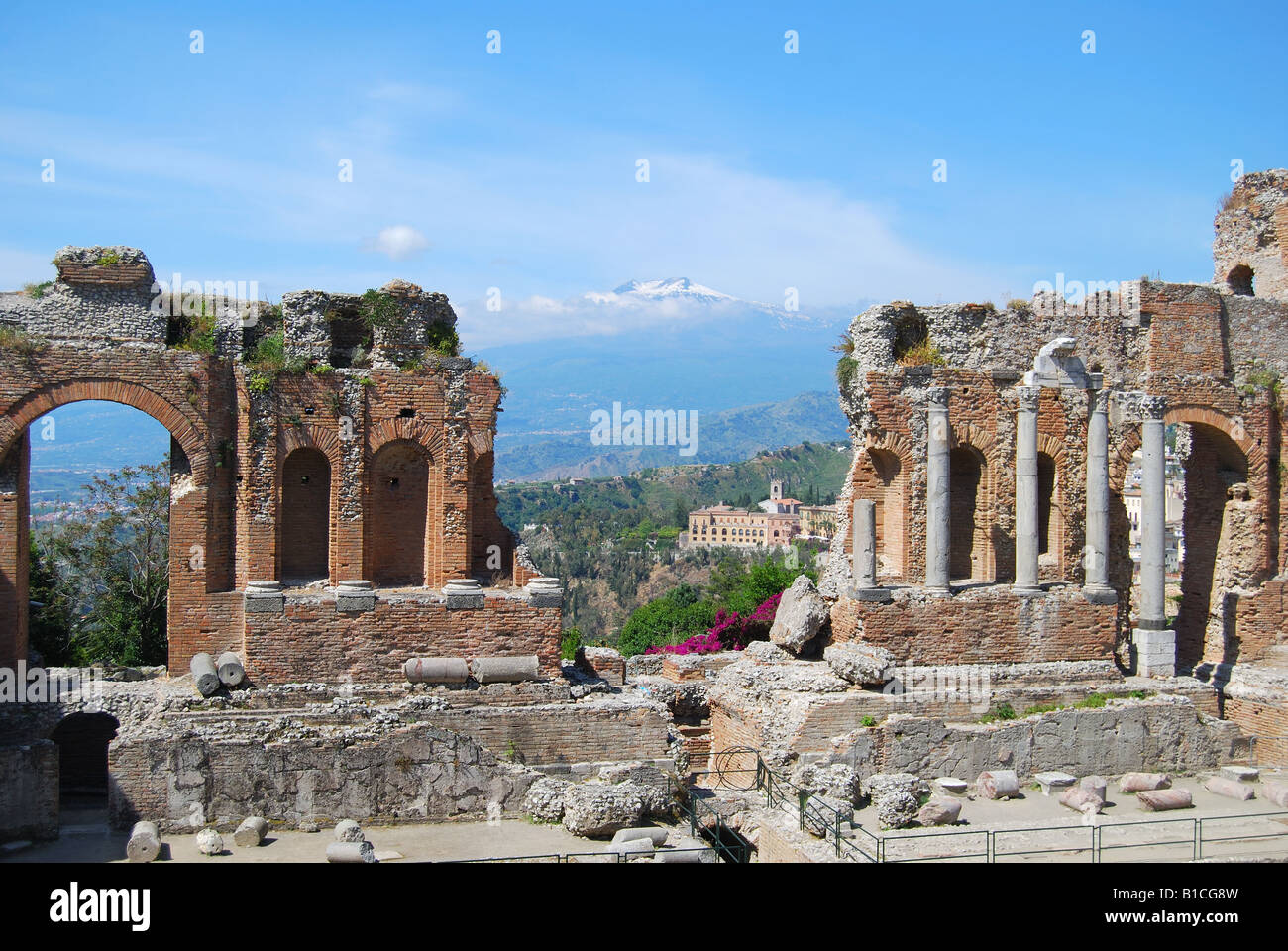 The Teatro Greco with Mount Etna behind, Taormina, Messina Province, Sicily, Italy Stock Photo