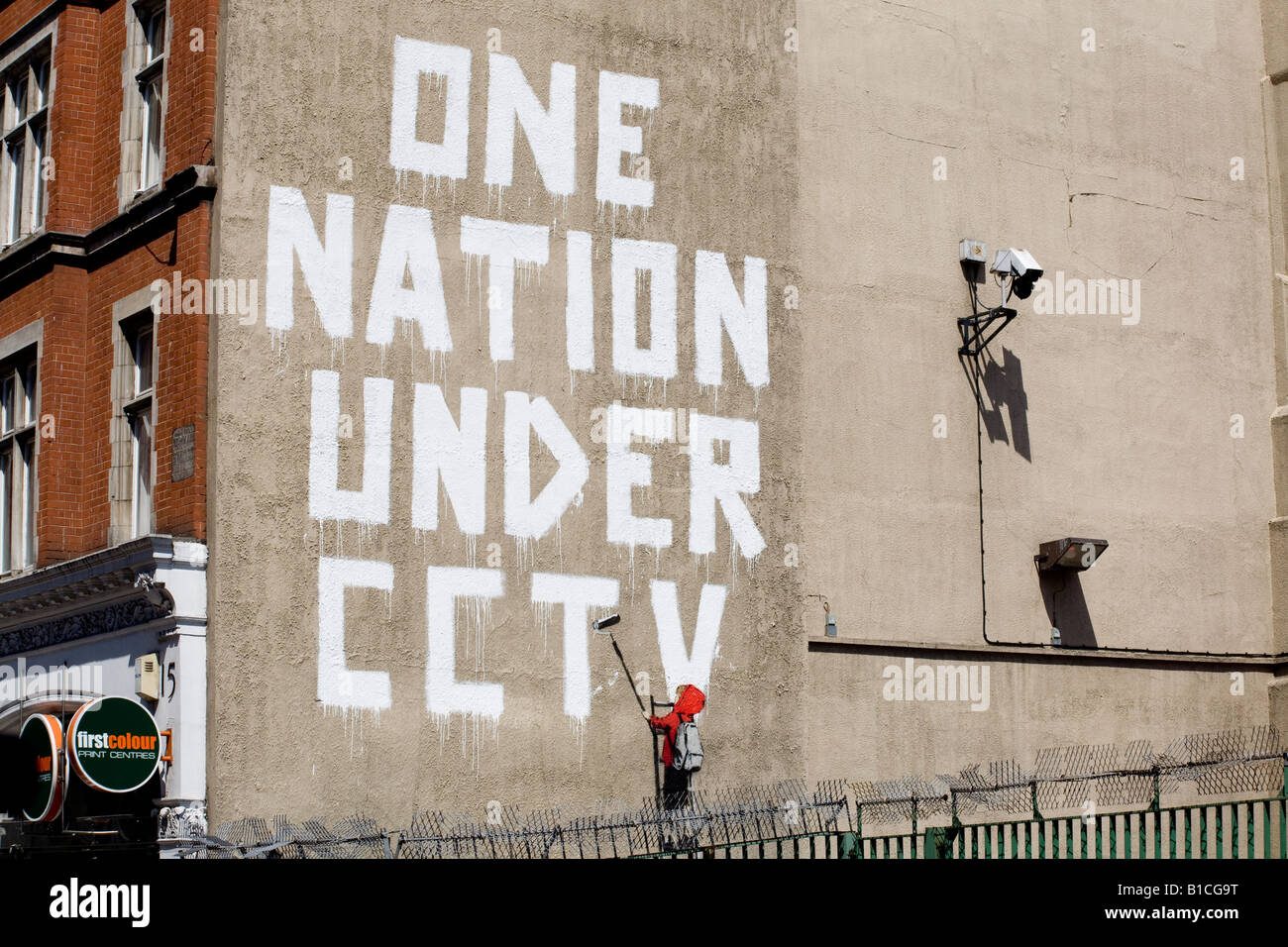 One Nation Under CCTV graffiti by Banksy. Newman Street