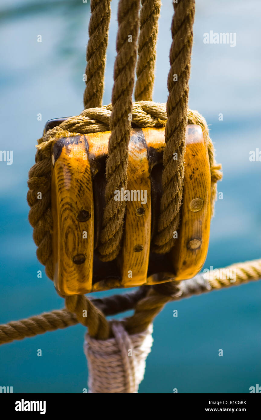 A wood block and rope on the schooner Pride of Baltimore II Stock Photo