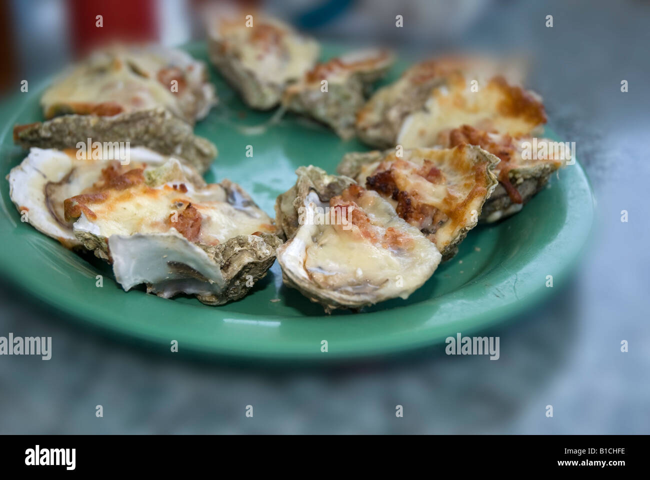 Baked oysters on half shell at restaurant, Eastpoint, Florida Stock