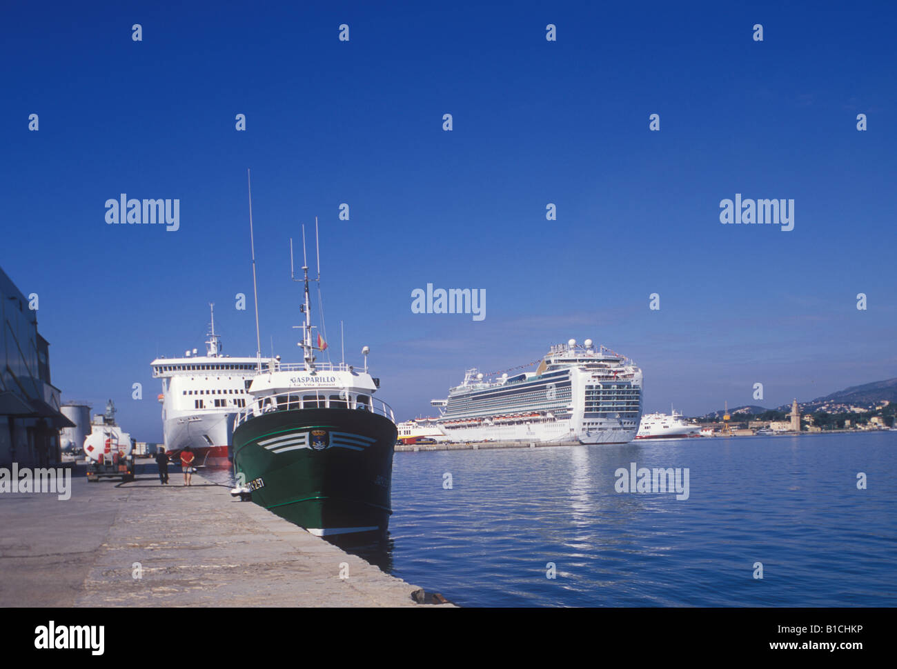 Scene in the Port of Palma de Mallorca  - fishing boat -  P and O Cruise ship Ventura. Stock Photo