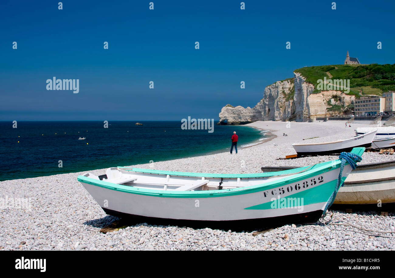 Boat on Etretat rocky beach, Normandy France Stock Photo - Alamy