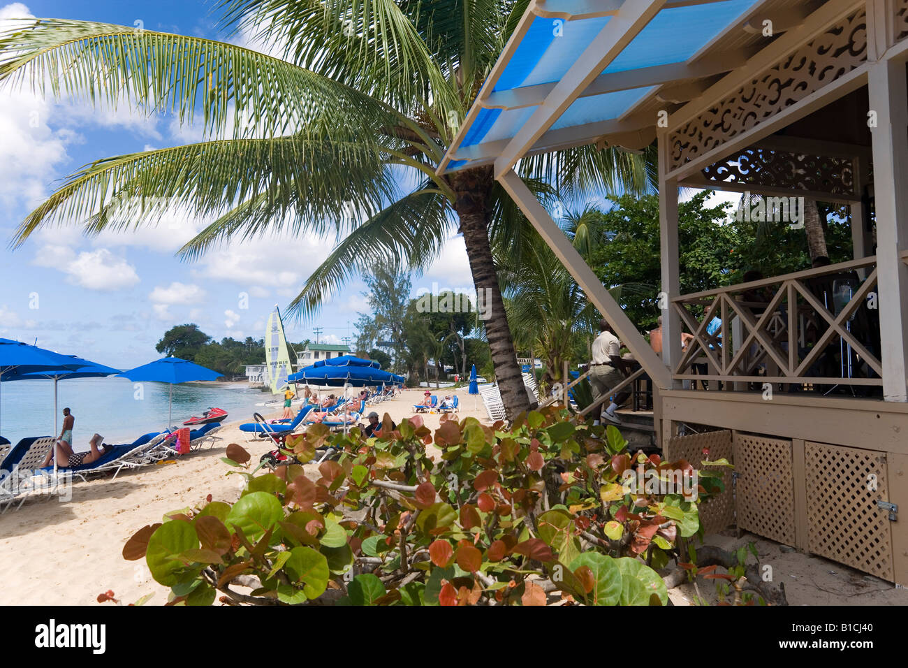 People relaxing at beach Mullins Bay Speightstown Barbados Caribbean