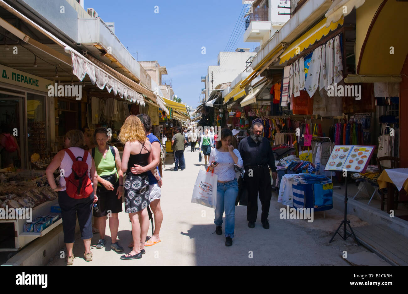 Shops opening onto narrow street giving market feel in Heraklion