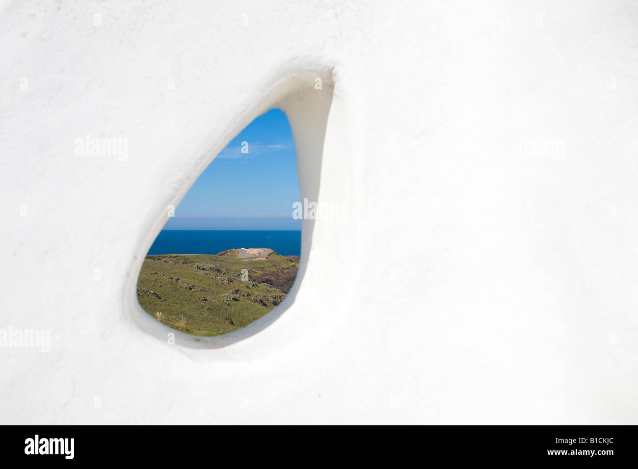 Punta Ballena seen through a tear shaped hole in Casapueblo Punta del Este Uruguay Stock Photo
