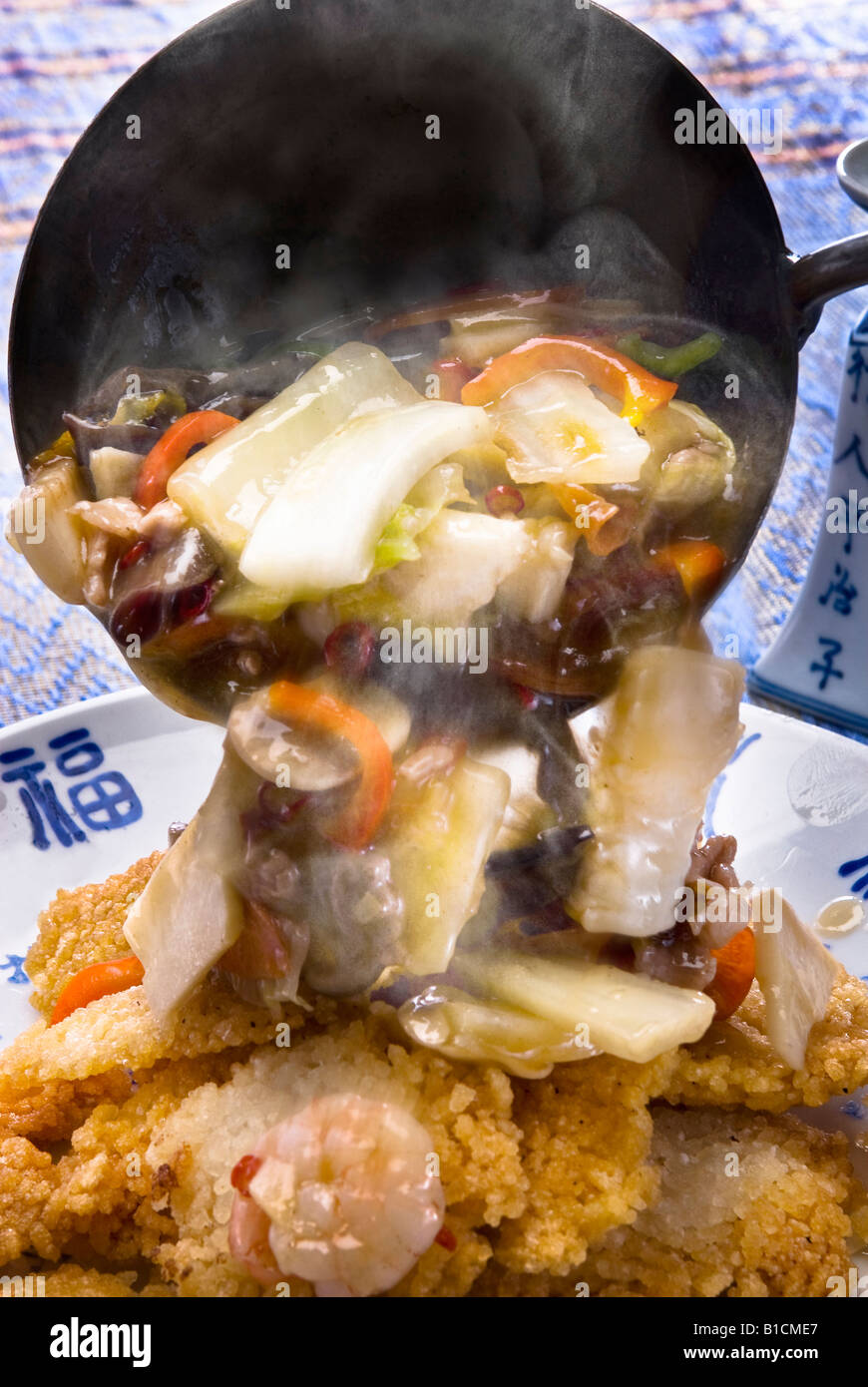 Stir-fried vegetables & seafood on rice Stock Photo - Alamy