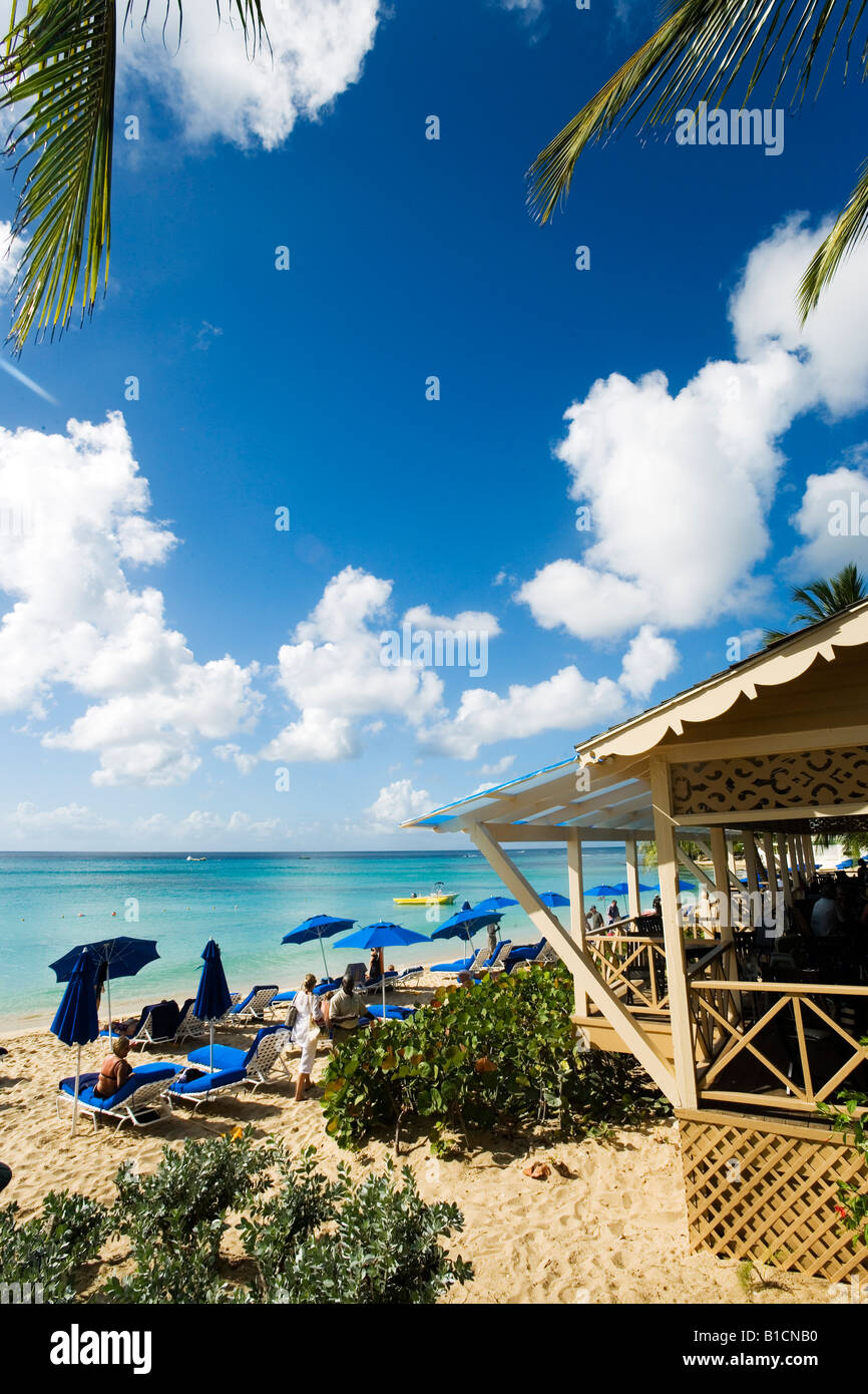 People relaxing at beach Mullins Bay Speightstown Barbados Caribbean