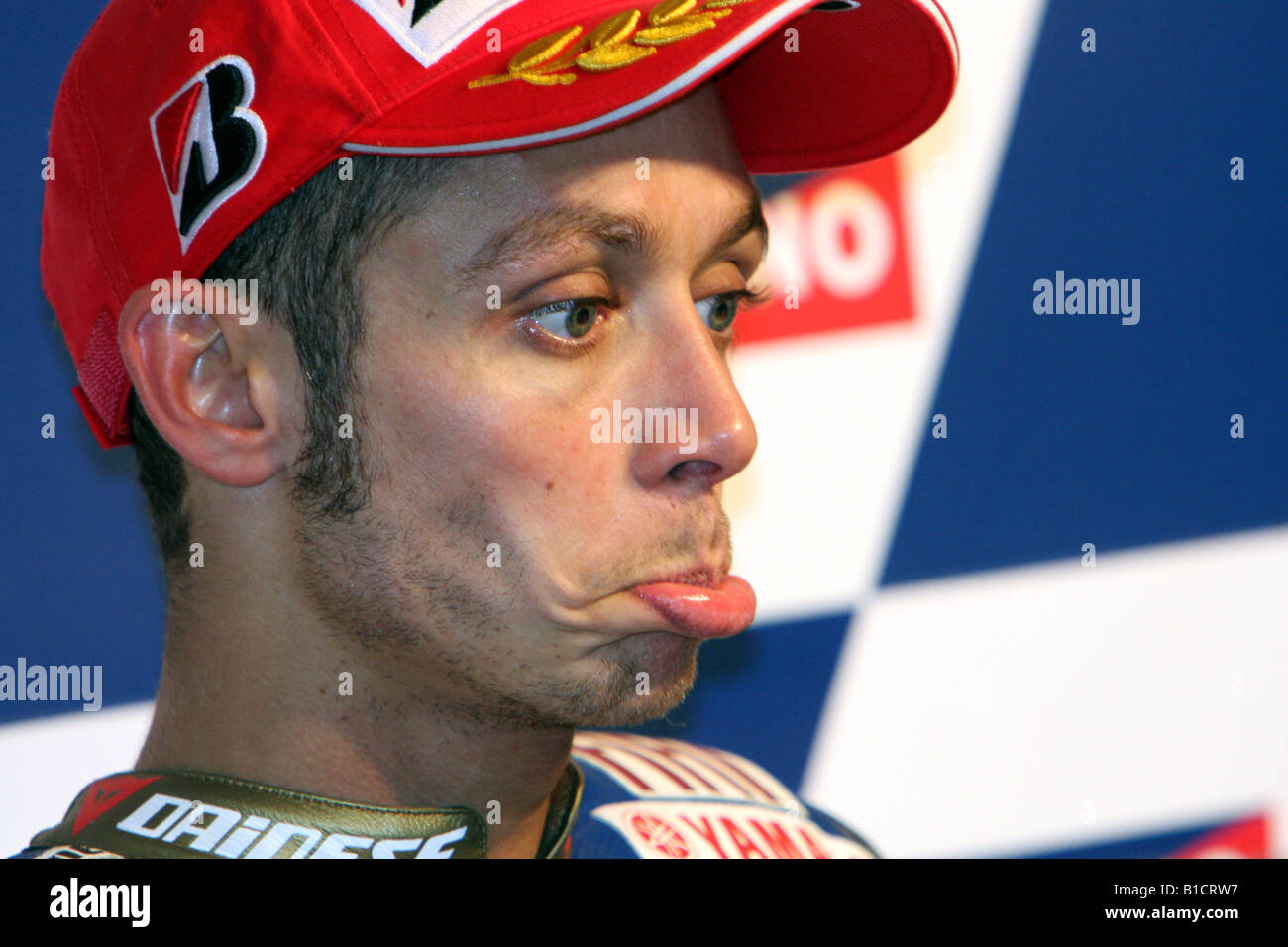 valentino the doctor rossi pulls a face after being asked a question by a  journalist in a motogp press conference Stock Photo - Alamy