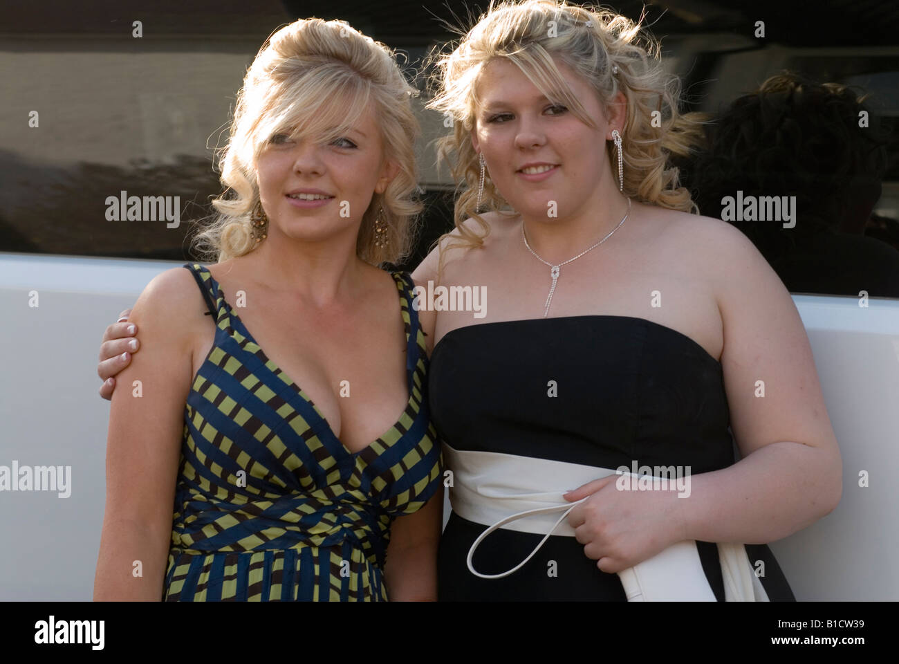 Sixteen year old teenage girls at a leaving school end of year Prom party Surrey England before leaving for the venue 2008 2000s UK HOMER SYKES Stock Photo