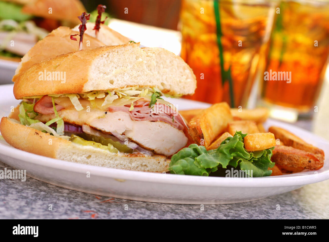 Grilled chicken cordon bleu with ham sandwich at an outdoor cafe Stock ...