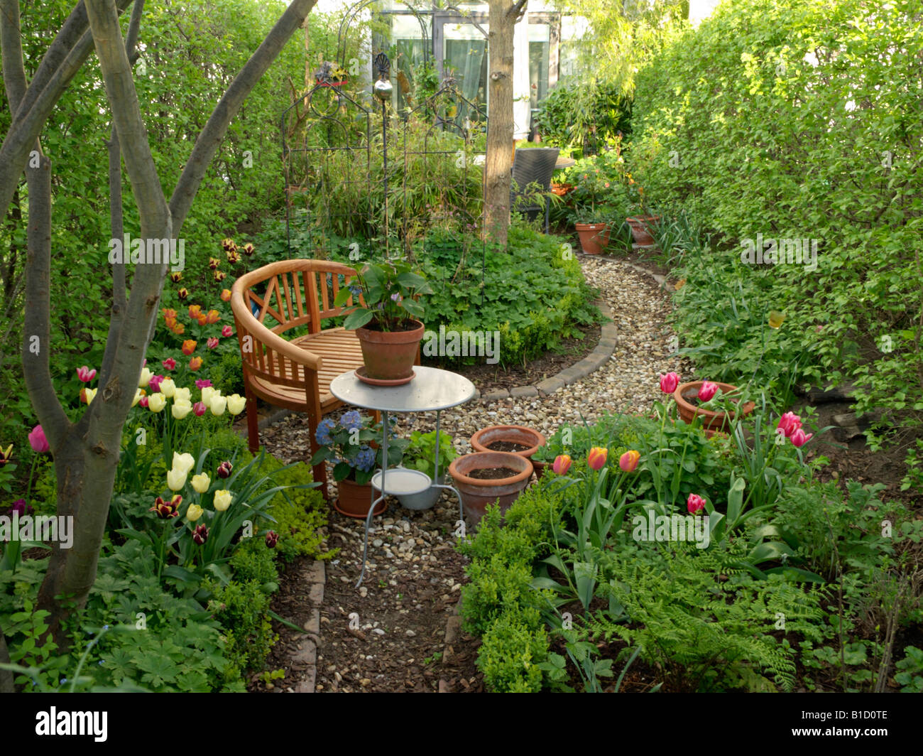 Row house garden with seating area Stock Photo