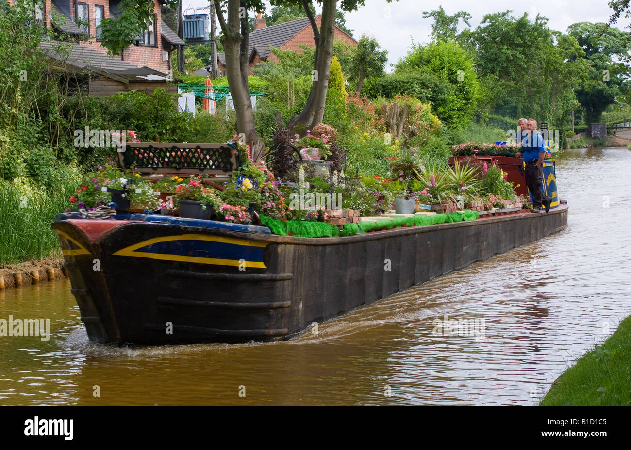 A British Waterways Narrow Boat Bedecked with Flowers for ...