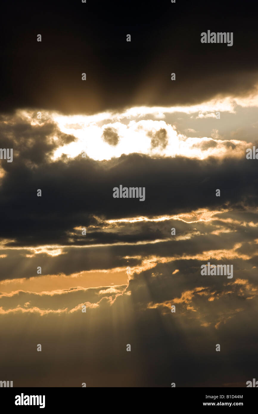Backlit clouds at sunset Stock Photo - Alamy