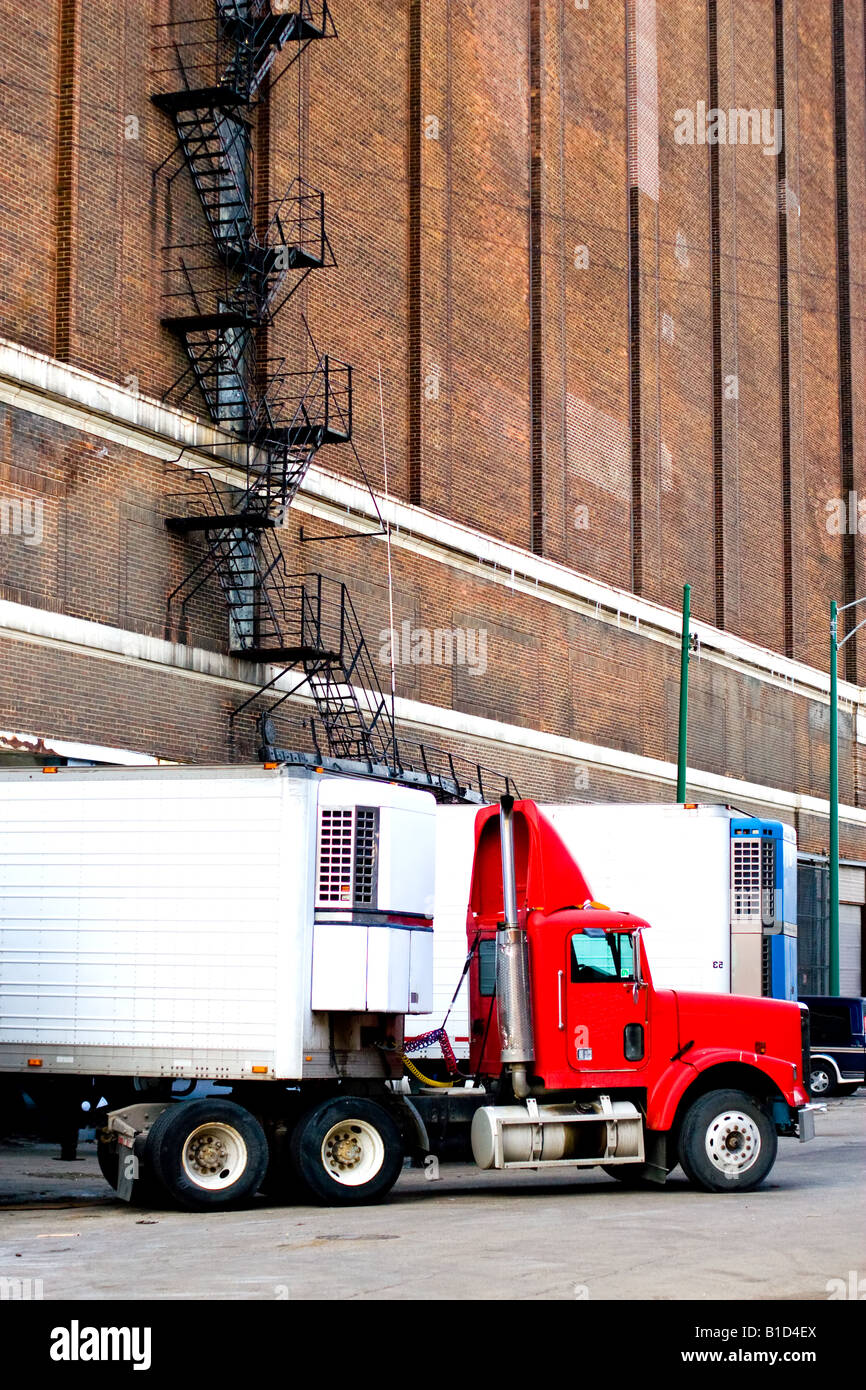 A semi tractor trailer truck at the warehouse dock in Chicago, IL. Stock Photo