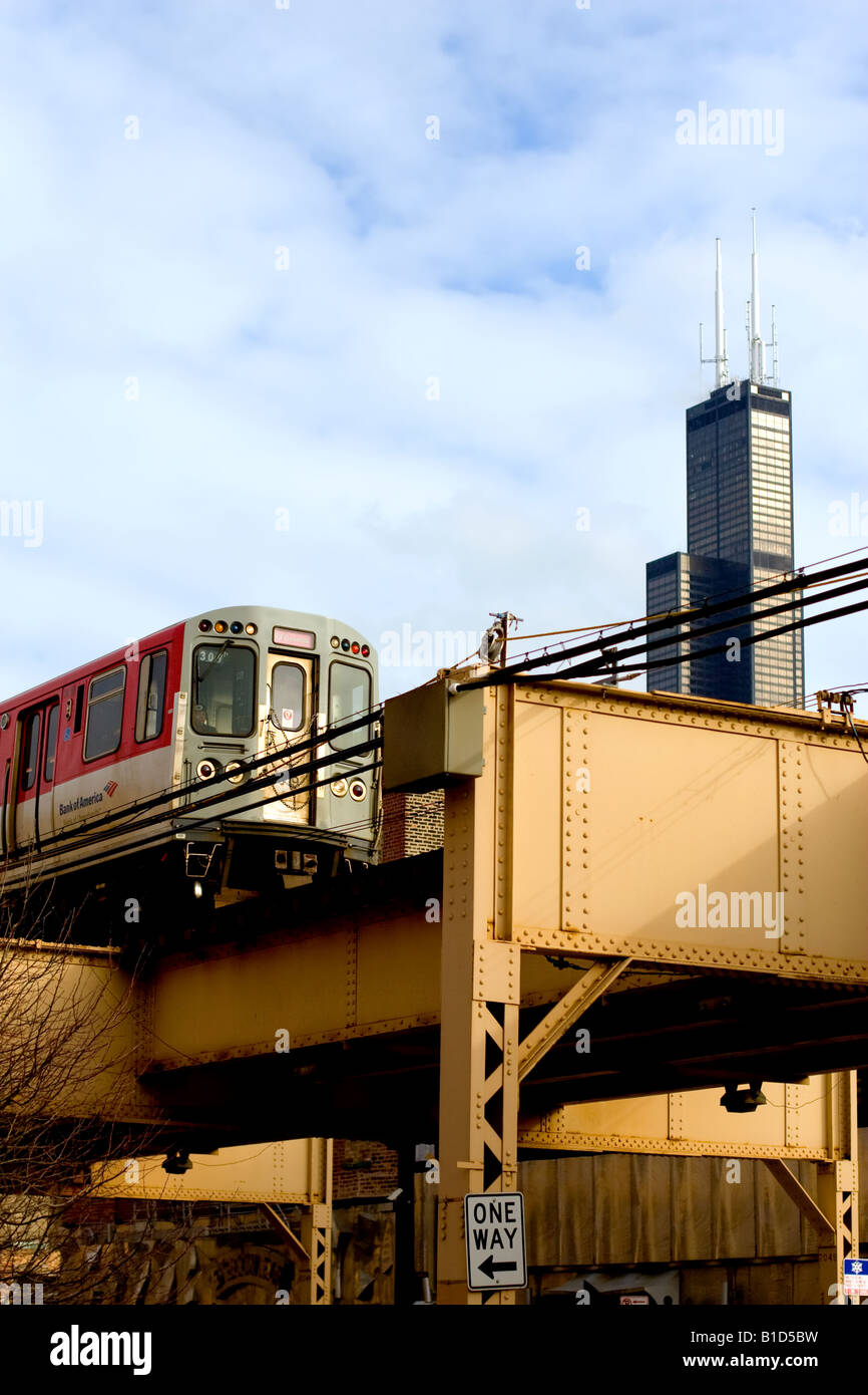 The Sears Tower stands over the Chicago Transit Authority's El tracks above Lake St. in Chicago, IL. Stock Photo