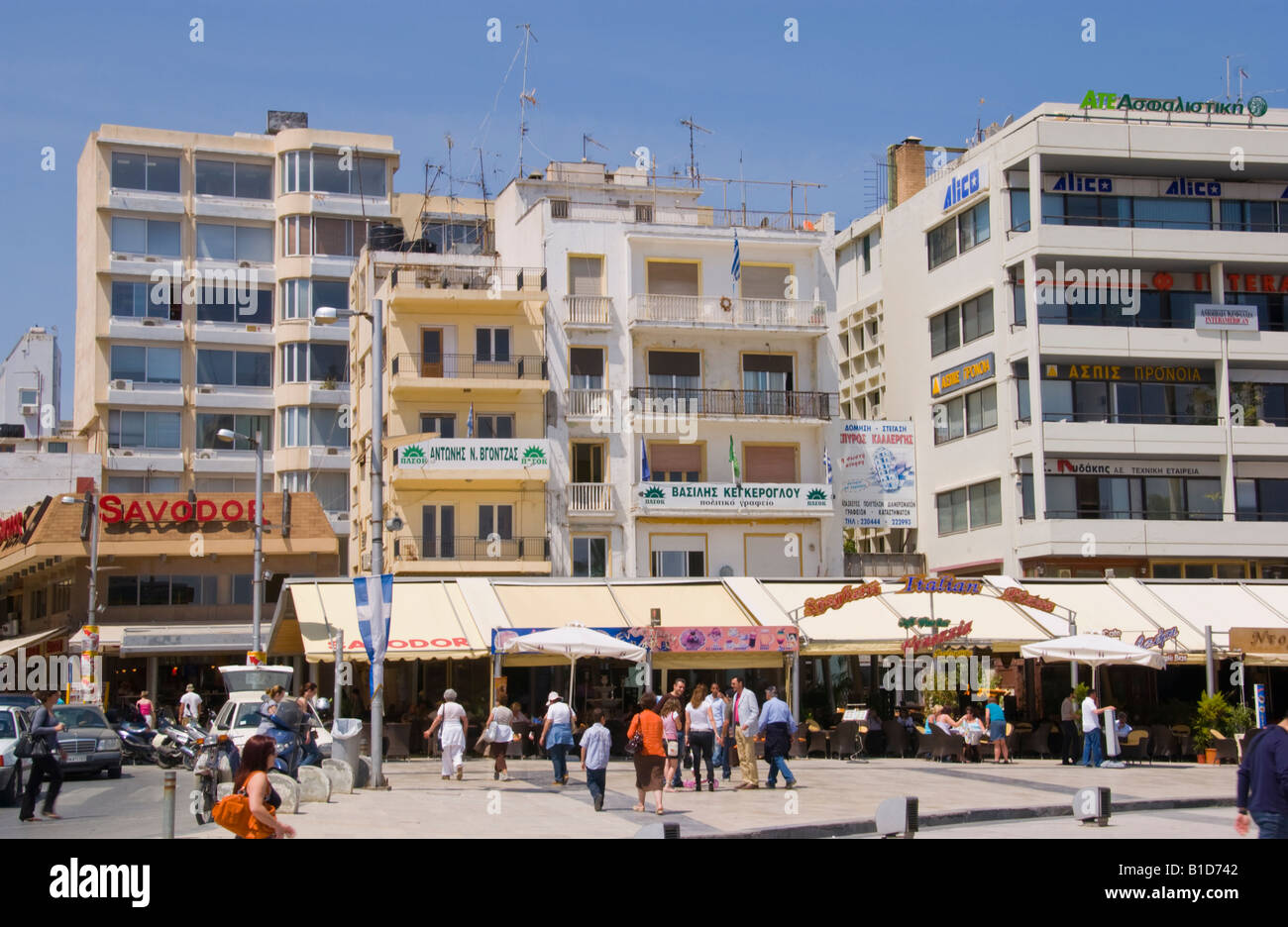 People in square in Heraklion capital and largest city on the Greek Mediterranean island of Crete Stock Photo